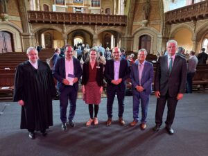 Jahresempfang der Lafim-Diakonie in der Erlöserkirche in Potsdam (von links): Frank Eibisch (Theologischer Leiter der Lafim-Diakonie), Dr. Jörg Antoine (Kaufmännischer Leiter der Lafim-Diakonie), Sabines Papies (Stabsstelle Unternehmensentwicklung und diakonische Kultur), Dr. Johannes Wagner (Staatssekretär im Ministerium für Soziales, Gesundheit und gesellschaftlichen Zusammenhalt), Dr. Dr. h.c. Markus Dröge (Landesbischof i.R.) und Tillmann Stenger (Kuratoriumsvorsitzender).
